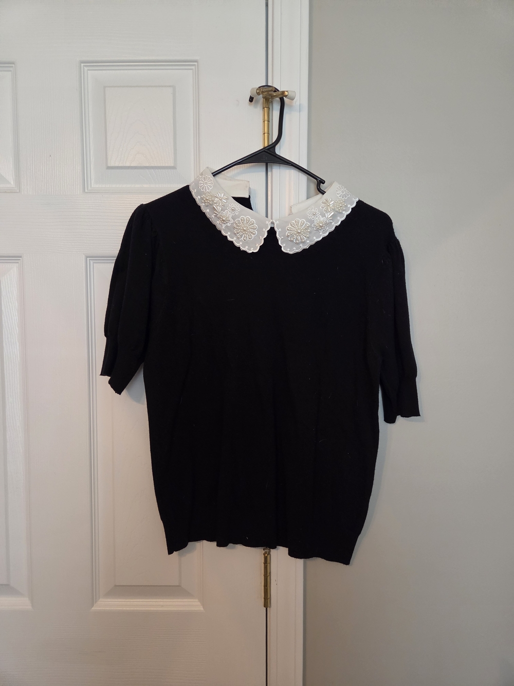 Sioni Black Short Sleeve Top with White Embroidered Peter Pan Collar